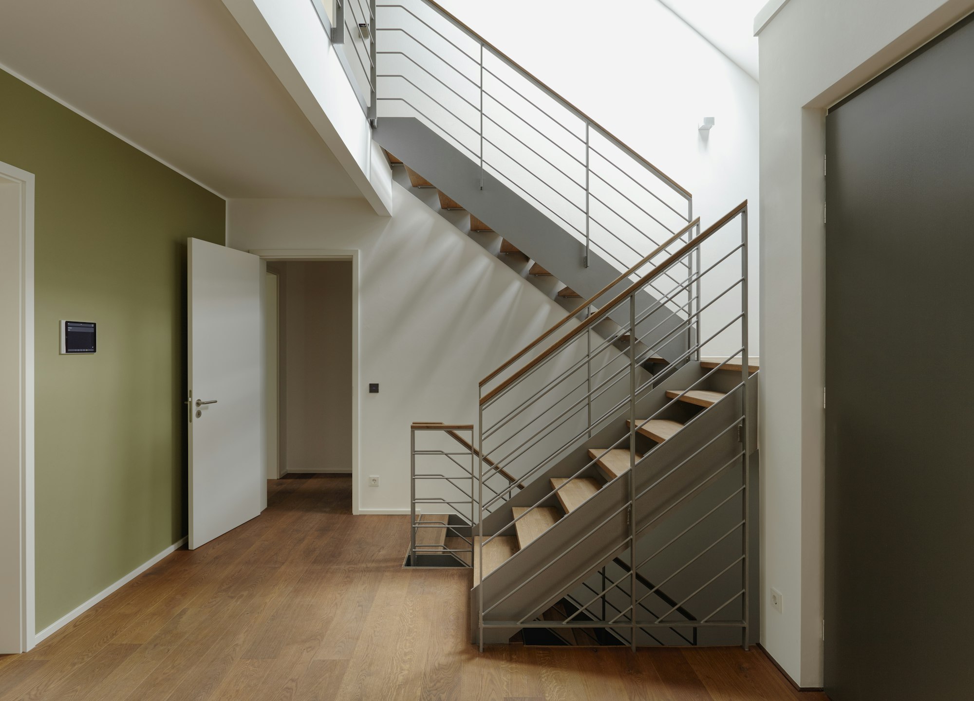 Plank floor and staircase in home